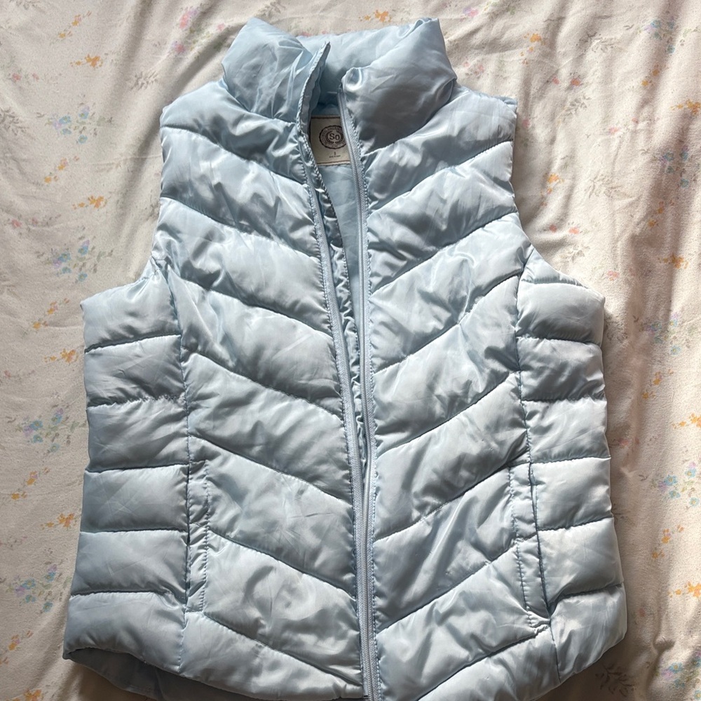 Light blue vest!